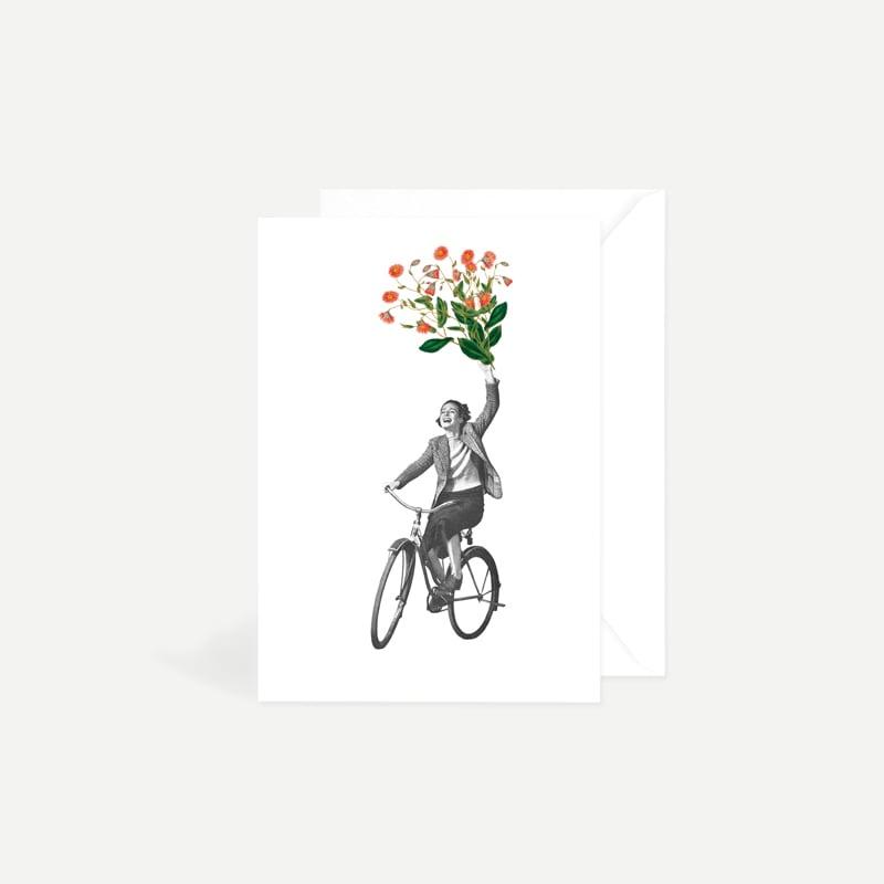 Grußkarte Radfahrerin mit Blumenstrauß